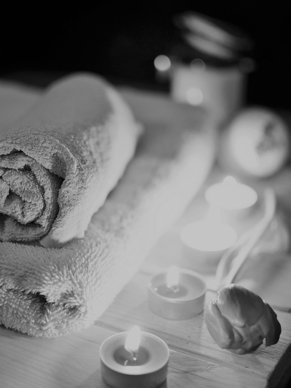 Massagehandtuch und Kerzen